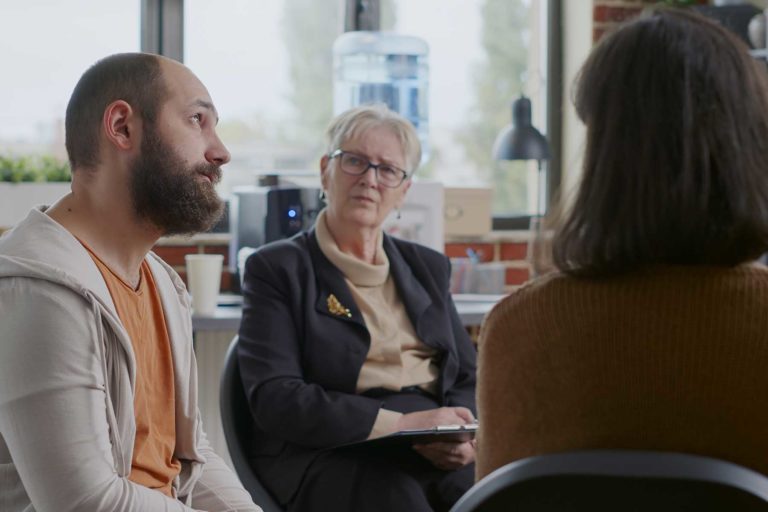a man starts to see positive change in himself after entering a residential rehab program