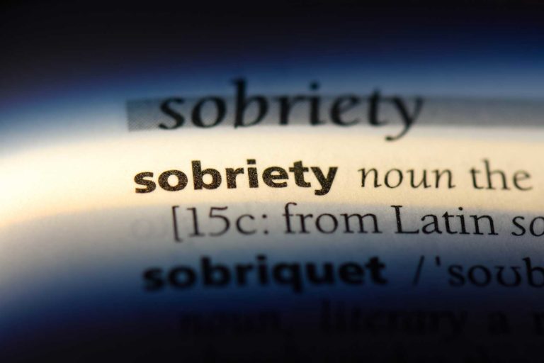 the word sobriety and partial definition as photographed in a dictionary