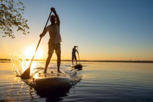 paddleboarder engaging in sober activities
