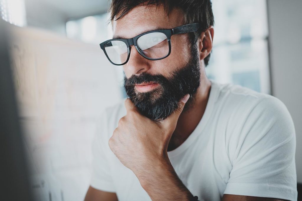 Man in glasses learning how to fight opiate cravings
