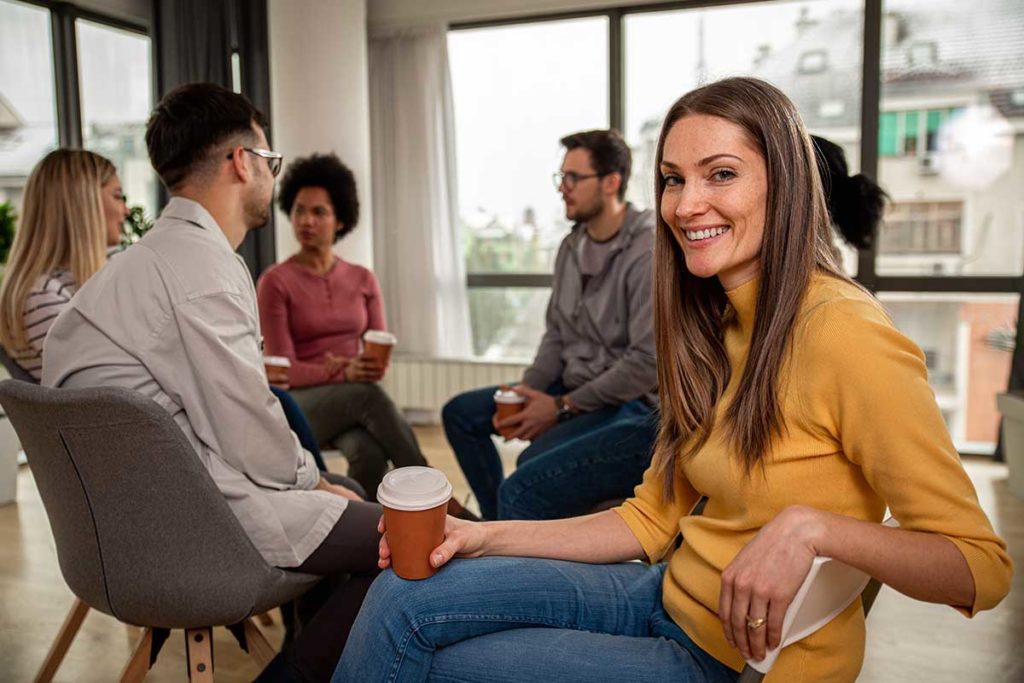 woman in group therapy learning how to get clean from cocaine