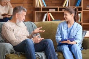 man and nurse discuss preparing for residential detox