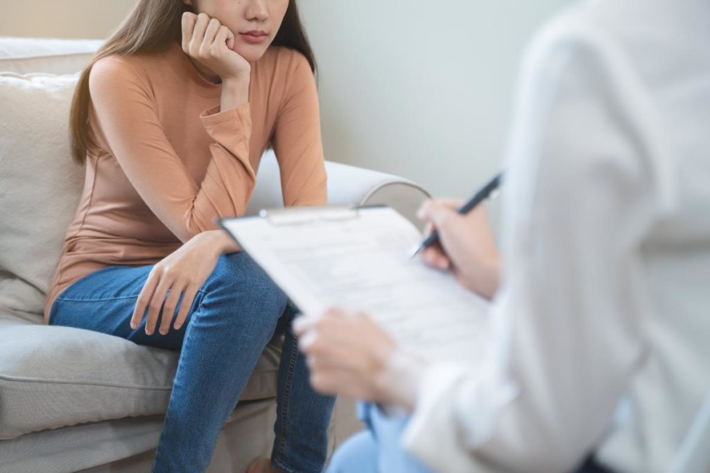 Woman learning anger management techniques