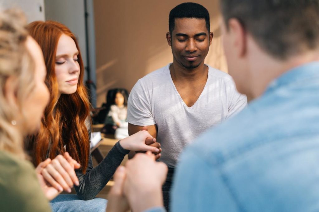 People engaged in holistic therapy