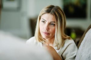 a woman learns the risks of adderall addiction and worries about her child in college abusing adderall 