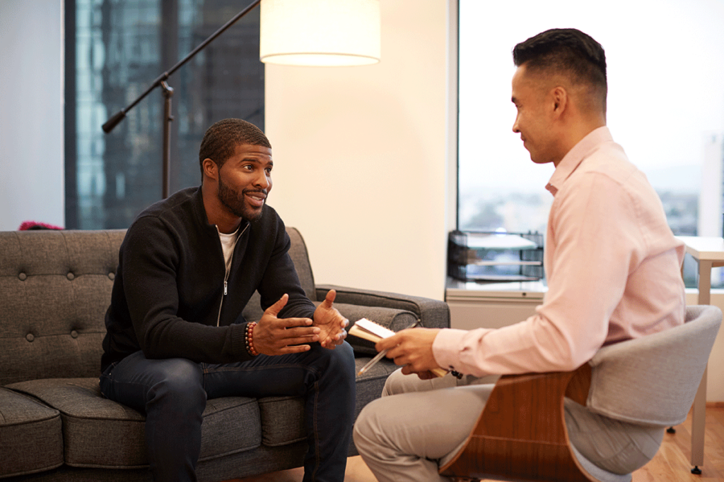 a man begins his first REBT therapy session for mental health treatment