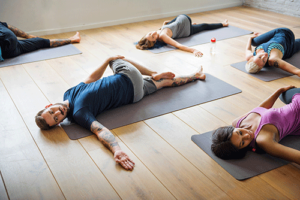 individuals in mental health treatment participate in yoga therapy as part of their plans 
