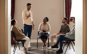 a therapy group for trauma treatments holds a meeting session