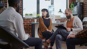 individuals gather for group therapy in their ecstasy abuse rehab