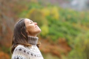 a woman practices self care to improve her mental health