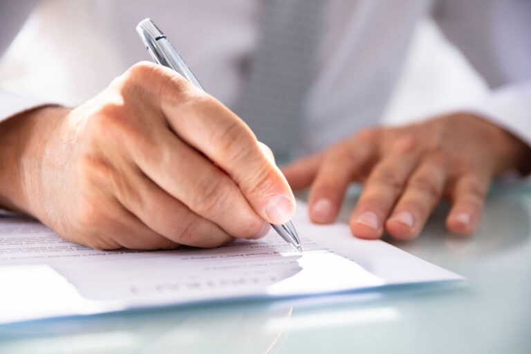 doctor filling out a 1013 form in georgia