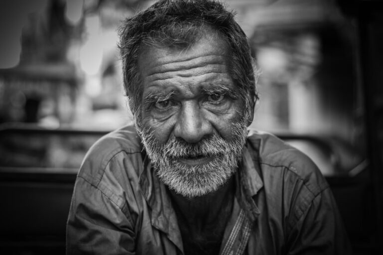 Elderly man in black and white