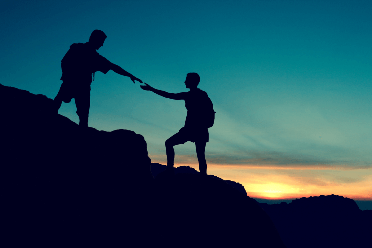 two climbers going up mountain