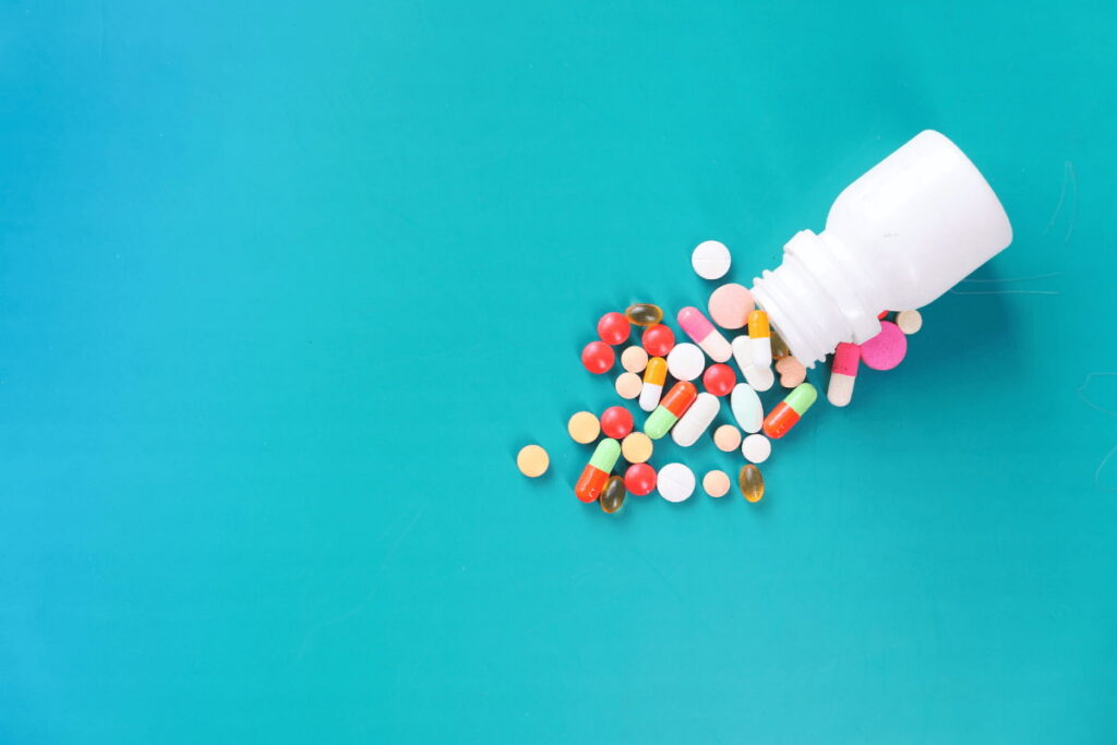 lexapro and xanax poured out of a bottle