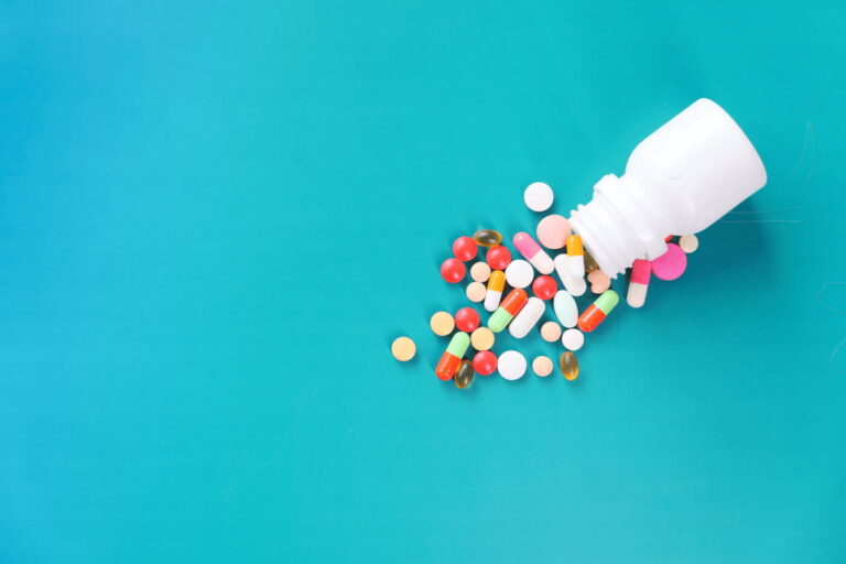 lexapro and xanax poured out of a bottle