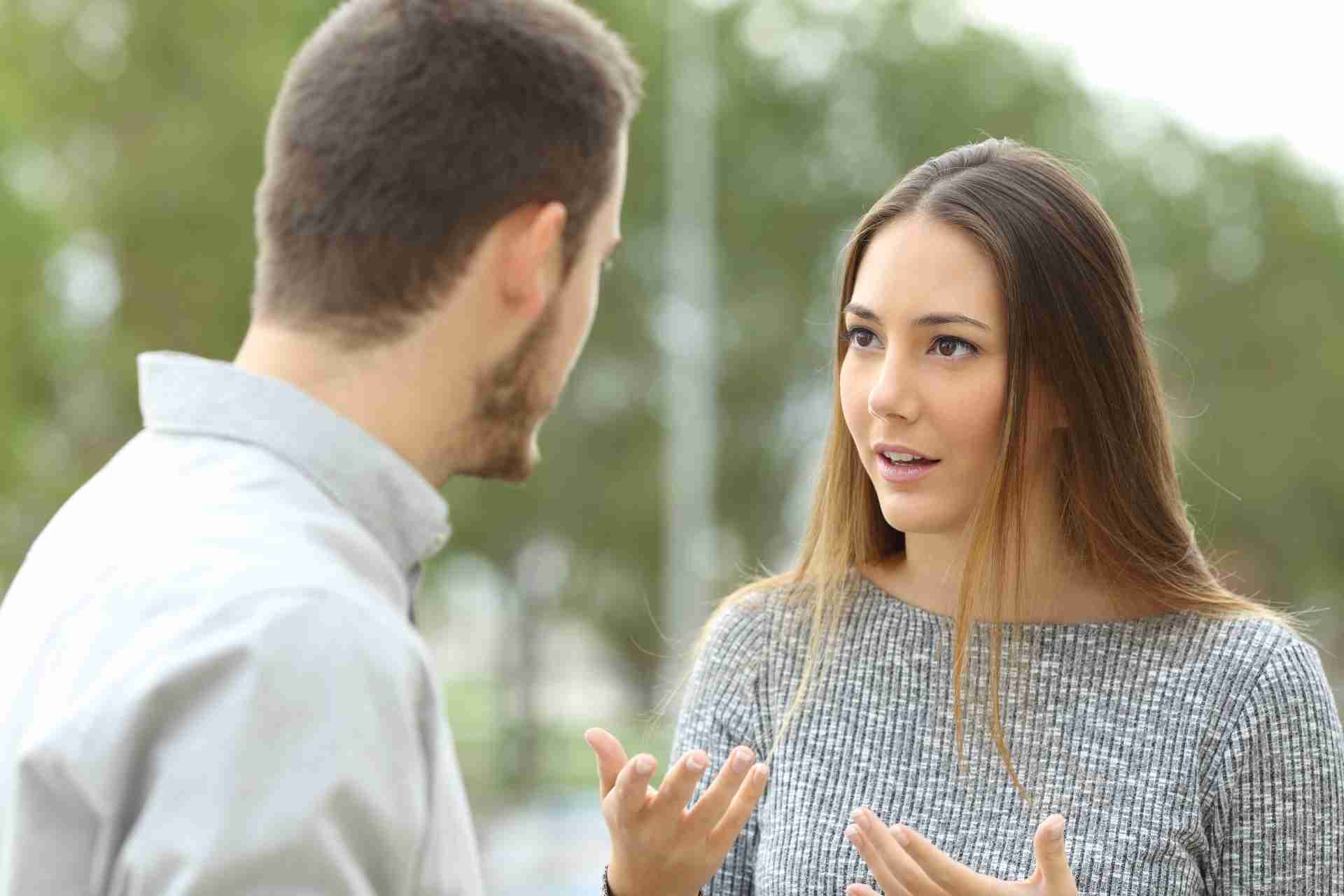 Woman discussing addiction treatment options with a family member or loved one
